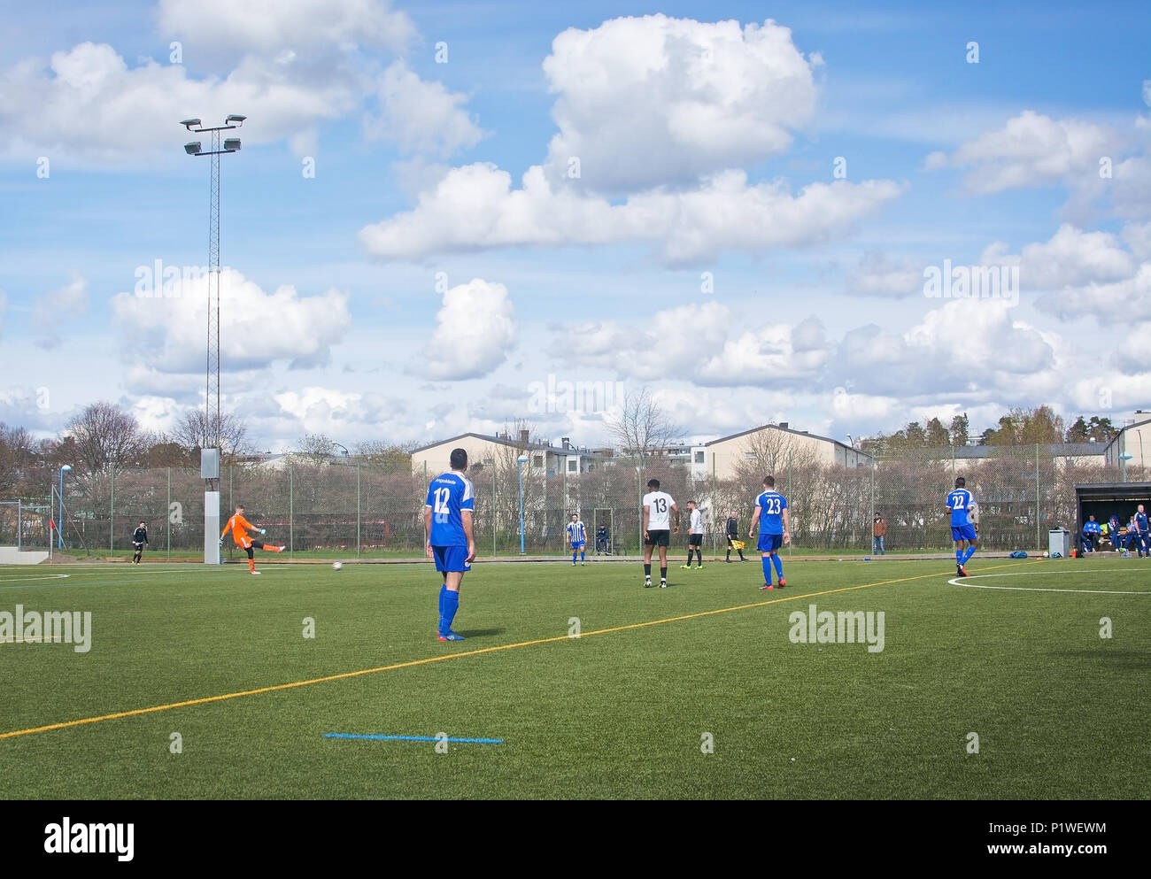 STOCKHOLM, SWEDEN - APRIL 28, 2018: Soccer football game on artificial grass in 4 division north Spanga IP on April 28, 2018 in Stockholm, Sweden. Stock Photo