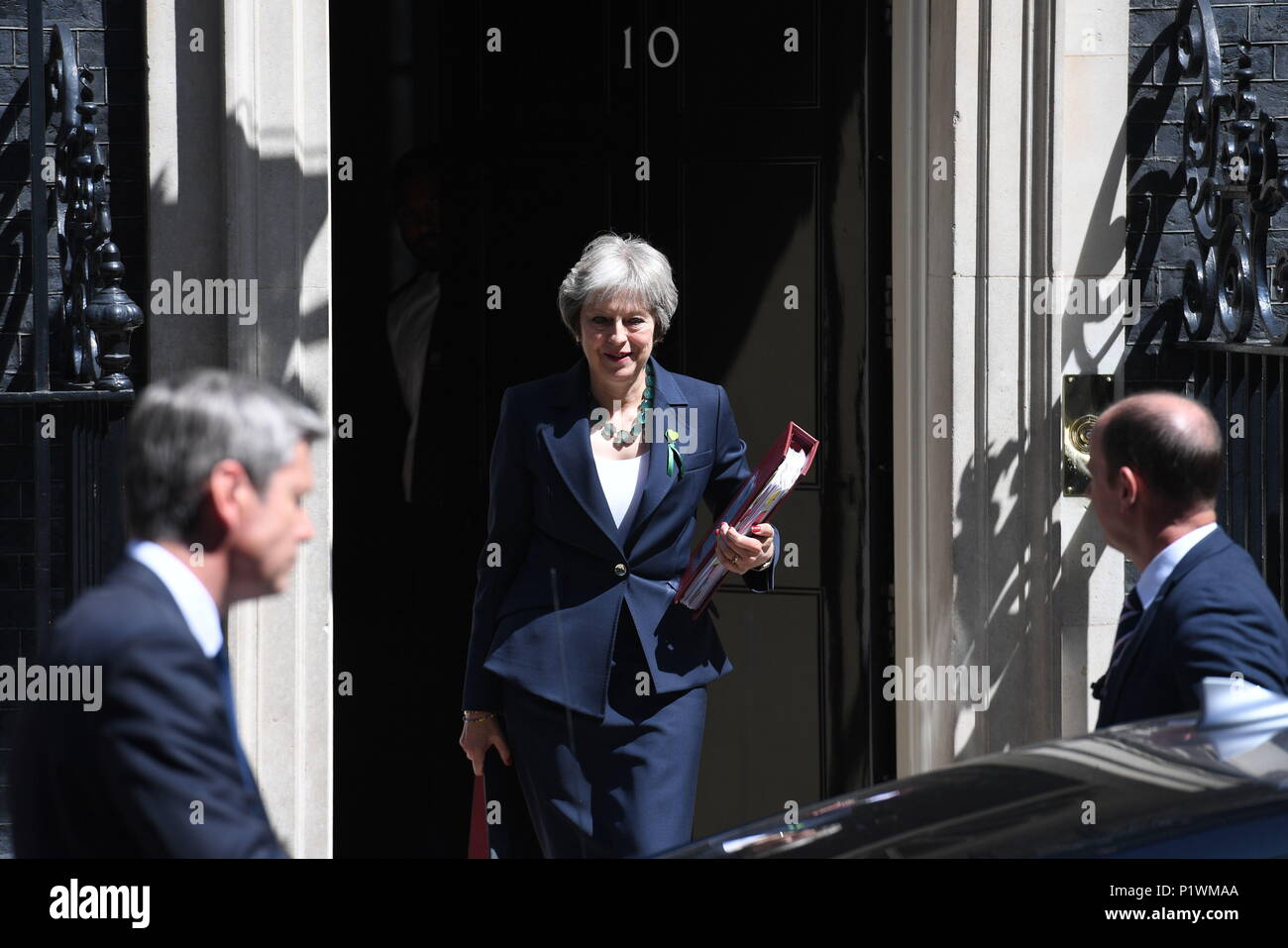 Prime Minister Theresa May leaves 10 Downing Street, London, for the House of Commons to face Prime Minister's Questions. Picture date: Wednesday June 13, 2018. See PA story POLITICS PMQs. Photo credit should read: Stefan Rousseau/PA Wire Stock Photo