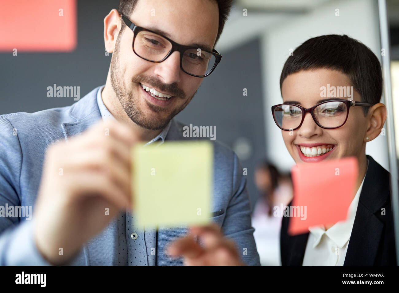 Business people meeting at office and use post it notes to share idea