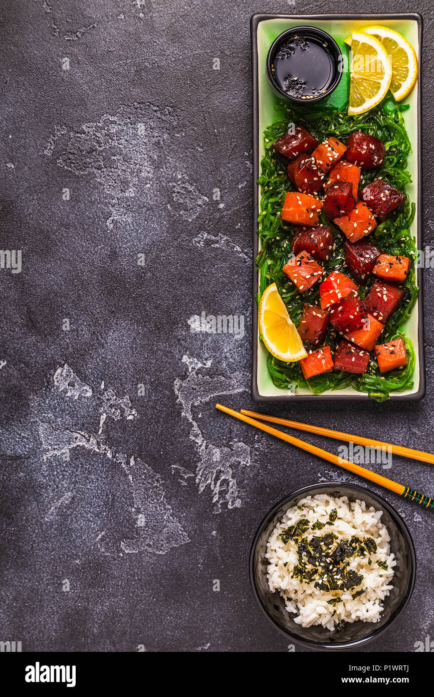 Poke, traditional Hawaiian raw fish salad, top view Stock Photo Alamy