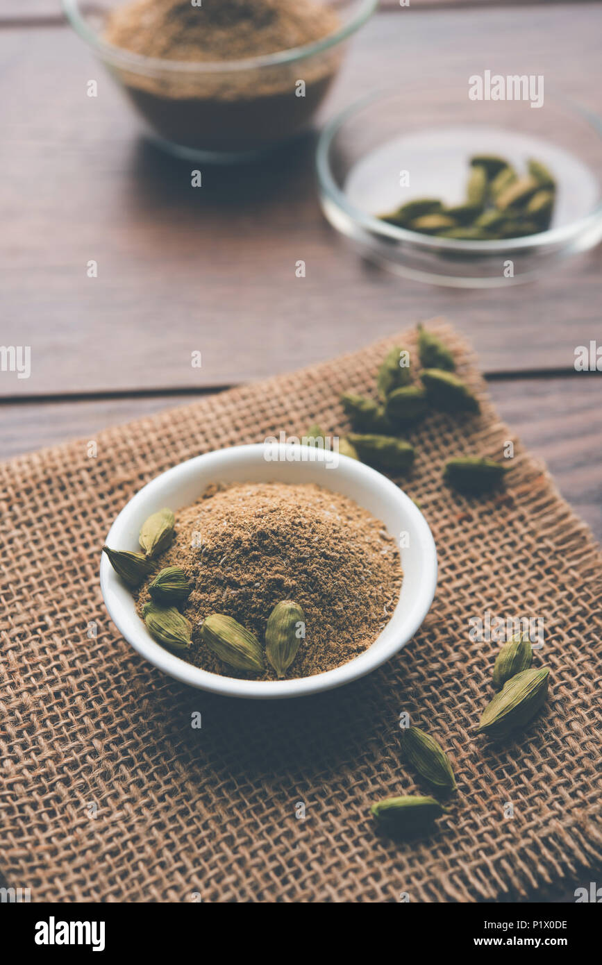 elaichi high resolution stock photography and images alamy https www alamy com elaichi or cardamom powder in bowl or heap over moody background with pods selective focus image207710202 html