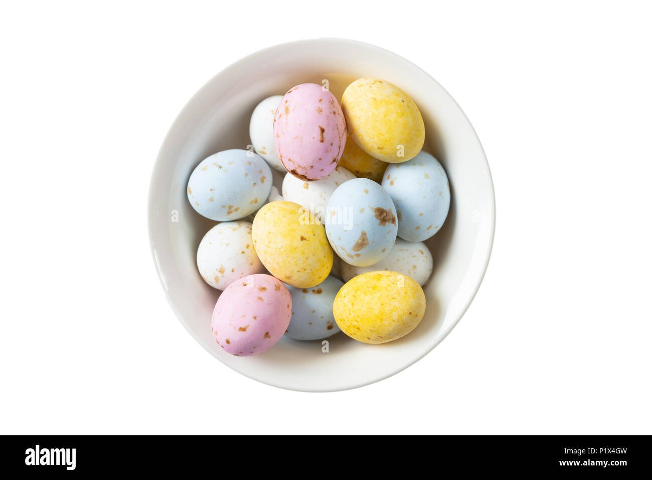 Season holidays concept. Colorful Easter eggs in a bowl, top view, cut out and isolated on white background Stock Photo