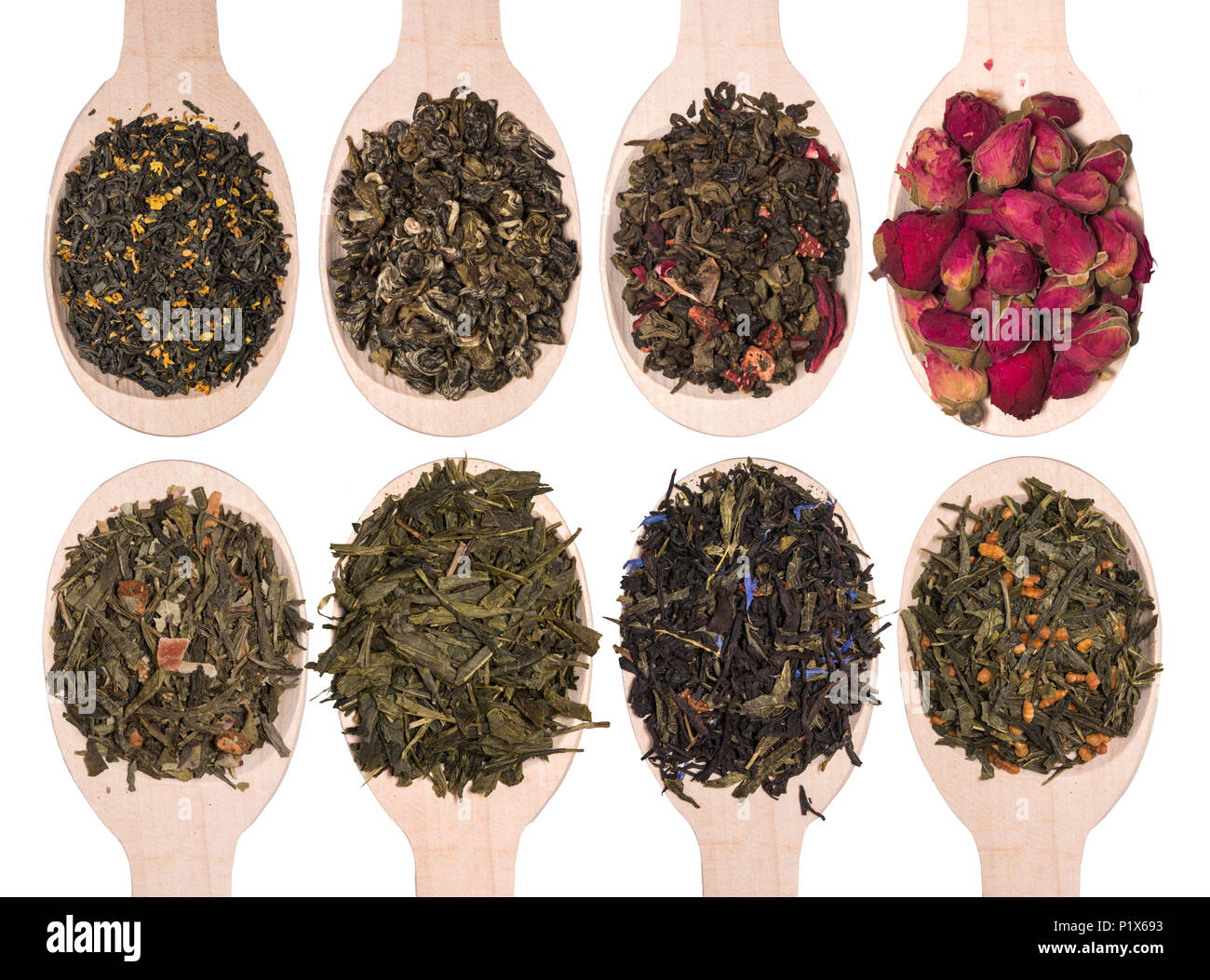 Dry Tea Set of different dry herbal teas in wooden spoons isolated on a white ...