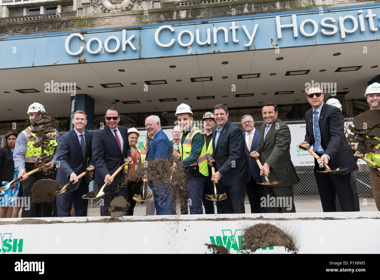 Attendees at the groundbreaking ceremony for the redevelopment of Cook