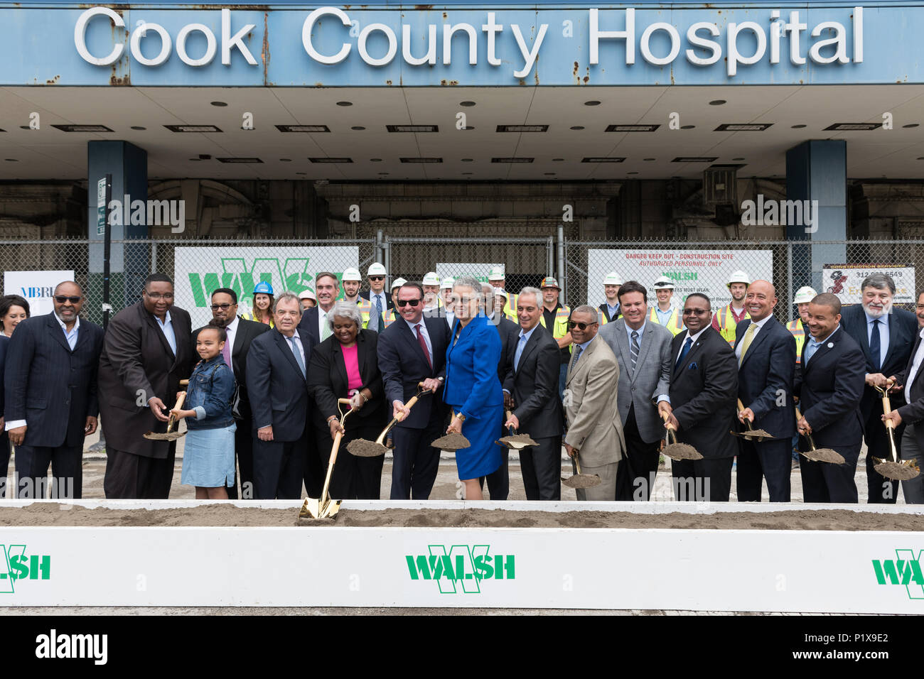 Attendees at the groundbreaking ceremony for the redevelopment of Cook