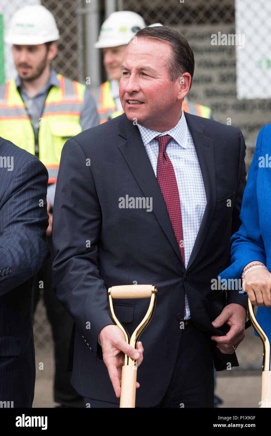 Attendees at the groundbreaking ceremony for the redevelopment of Cook