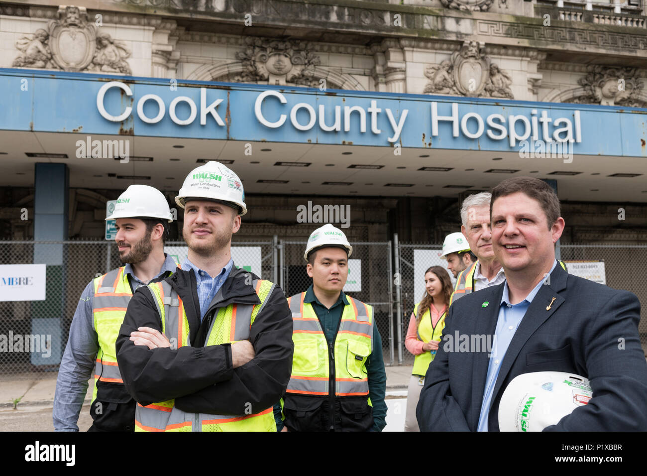 Attendees at the groundbreaking ceremony for the redevelopment of Cook County Hospital Stock Photo