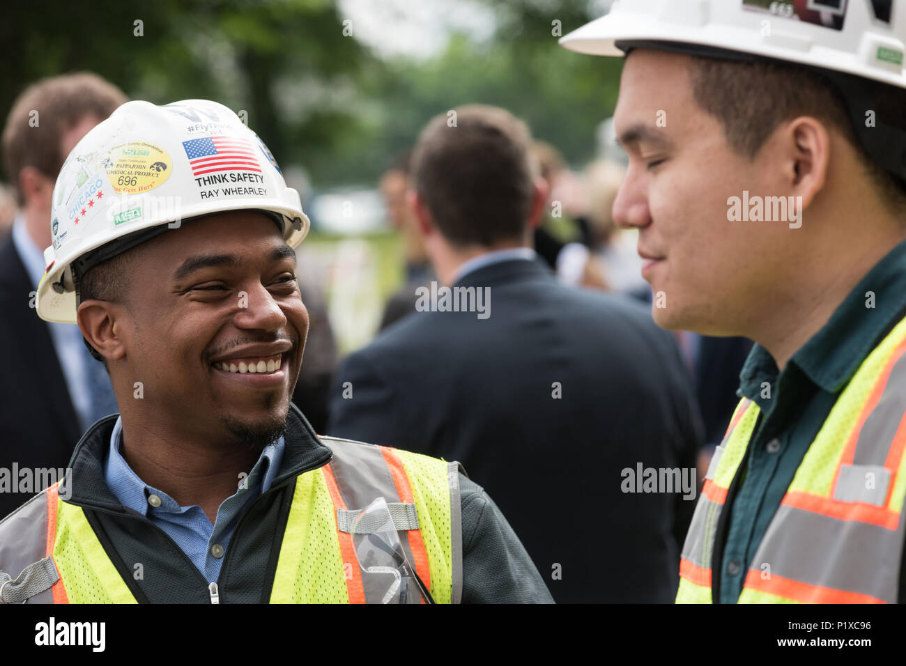 Attendees at the groundbreaking ceremony for the redevelopment of Cook