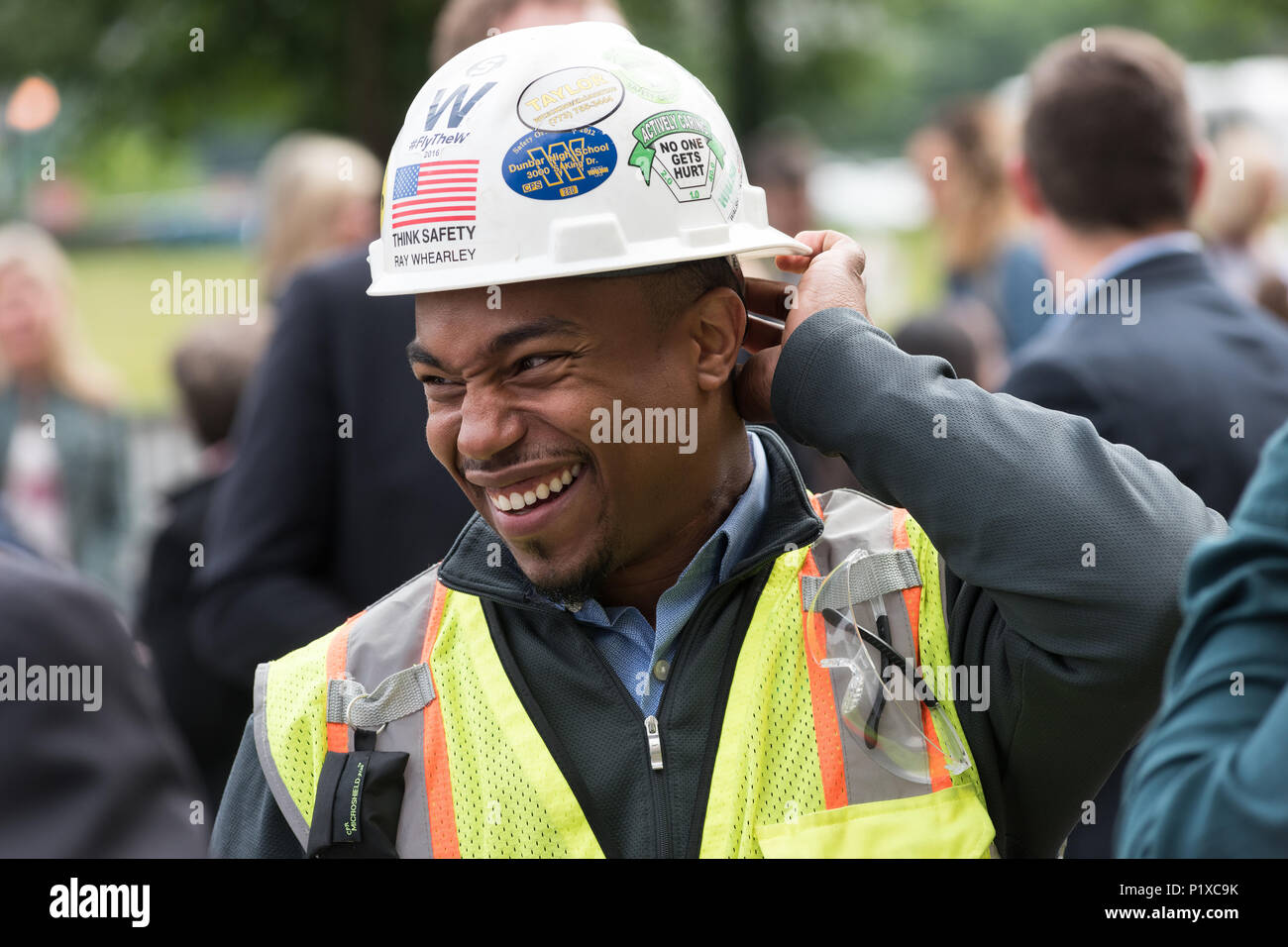Attendees at the groundbreaking ceremony for the redevelopment of Cook