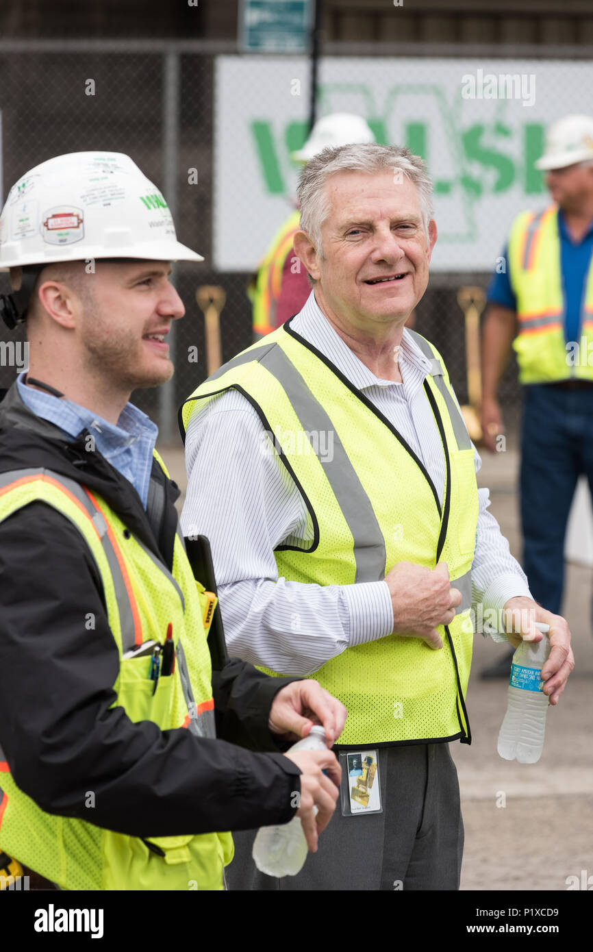 Attendees at the groundbreaking ceremony for the redevelopment of Cook
