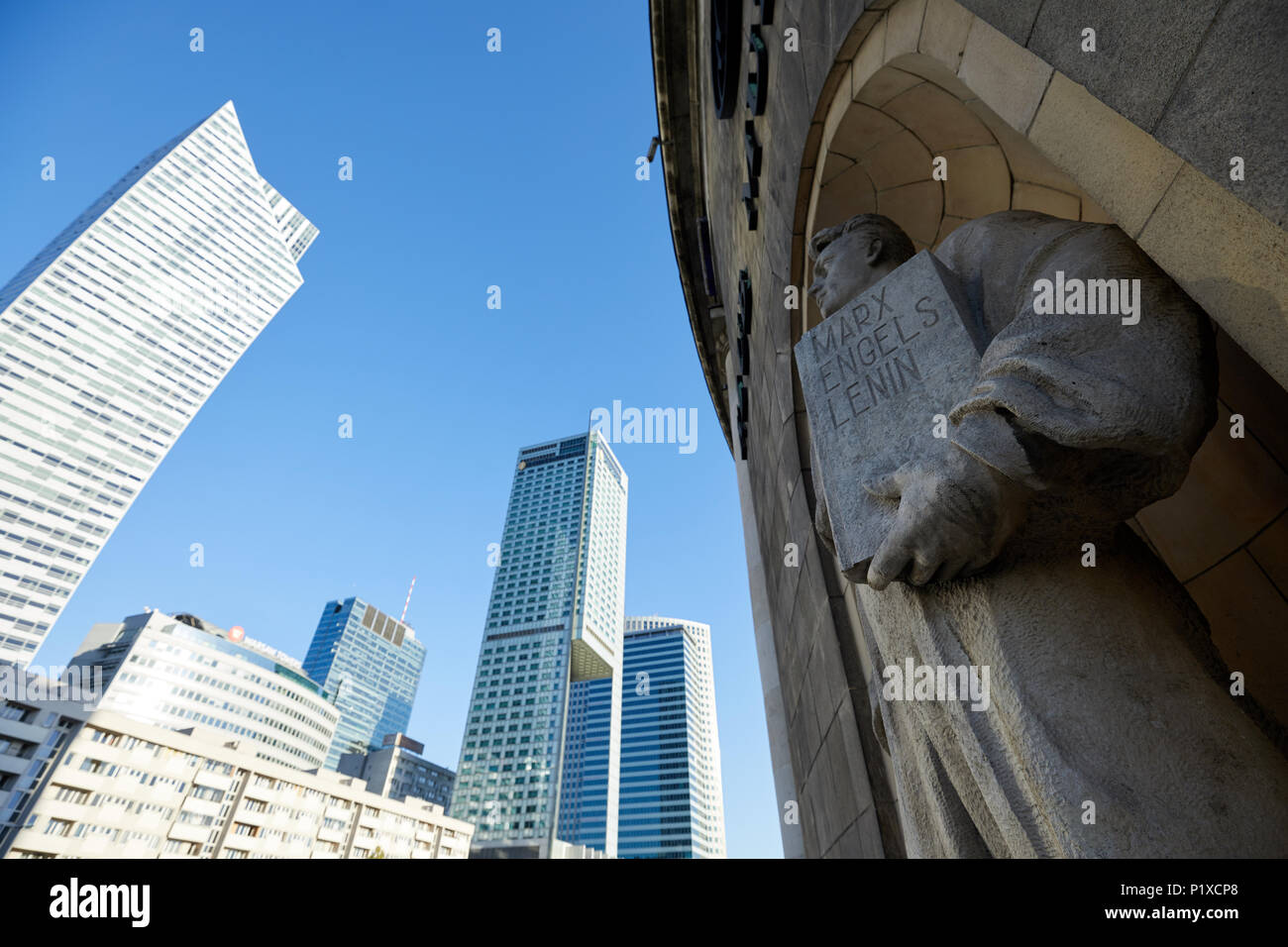 Warsaw, Poland. A statue of a soviet-era worker, holding a tablet ...