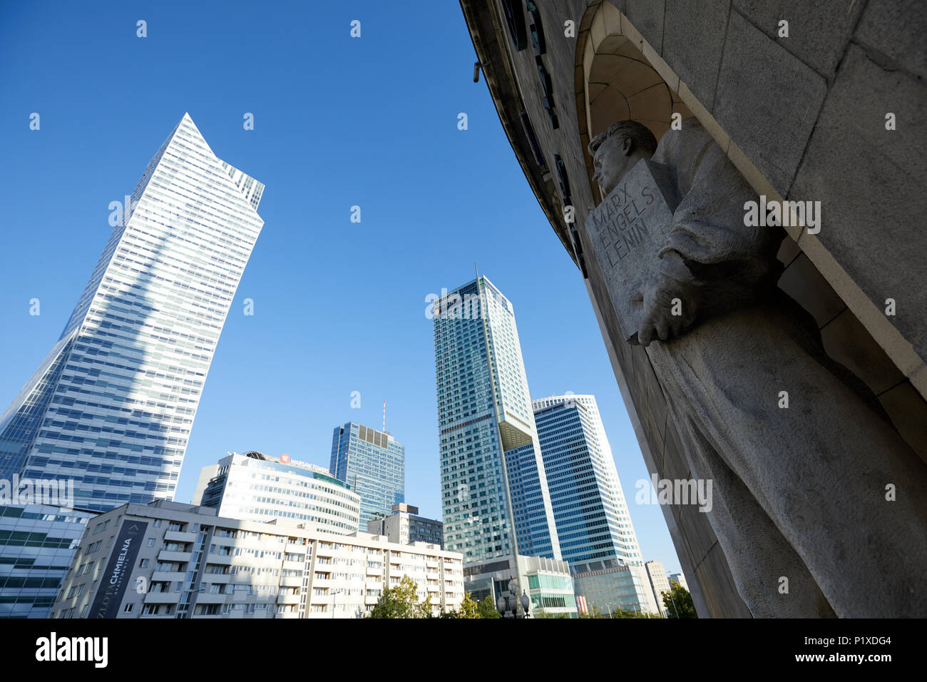 Warsaw, Poland. A statue of a soviet-era worker, holding a tablet ...