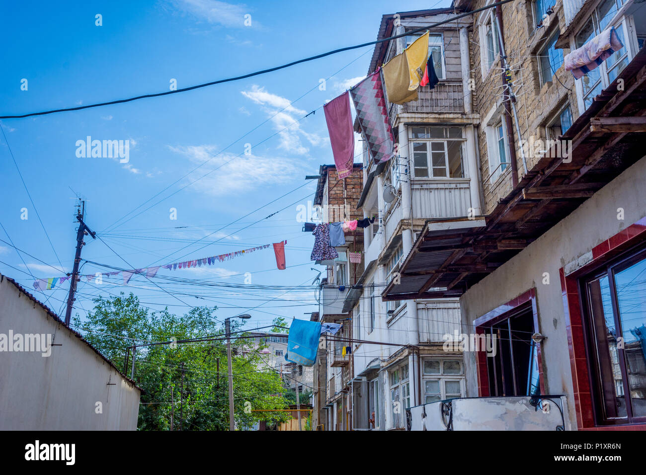 Laundry drying outside attached on the rope from the apartment building in Stepanakert, Nagorno Karabakh, Artsakh republic Stock Photo