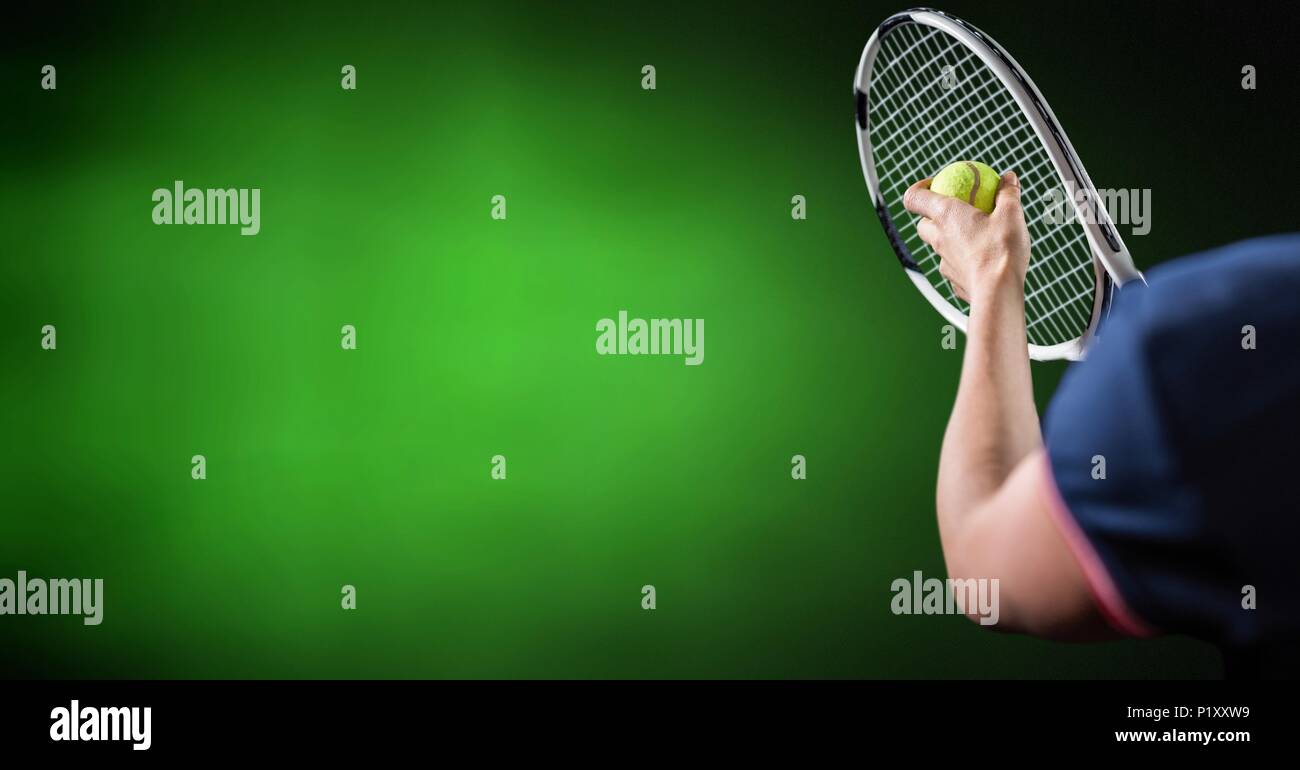 Tennis player with green background with racket Stock Photo - Alamy