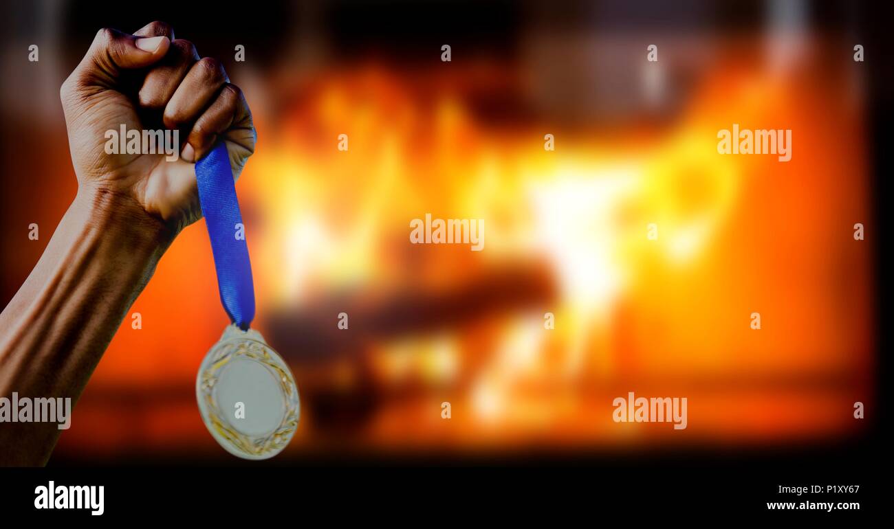 Champion sports medal and burning fire Stock Photo