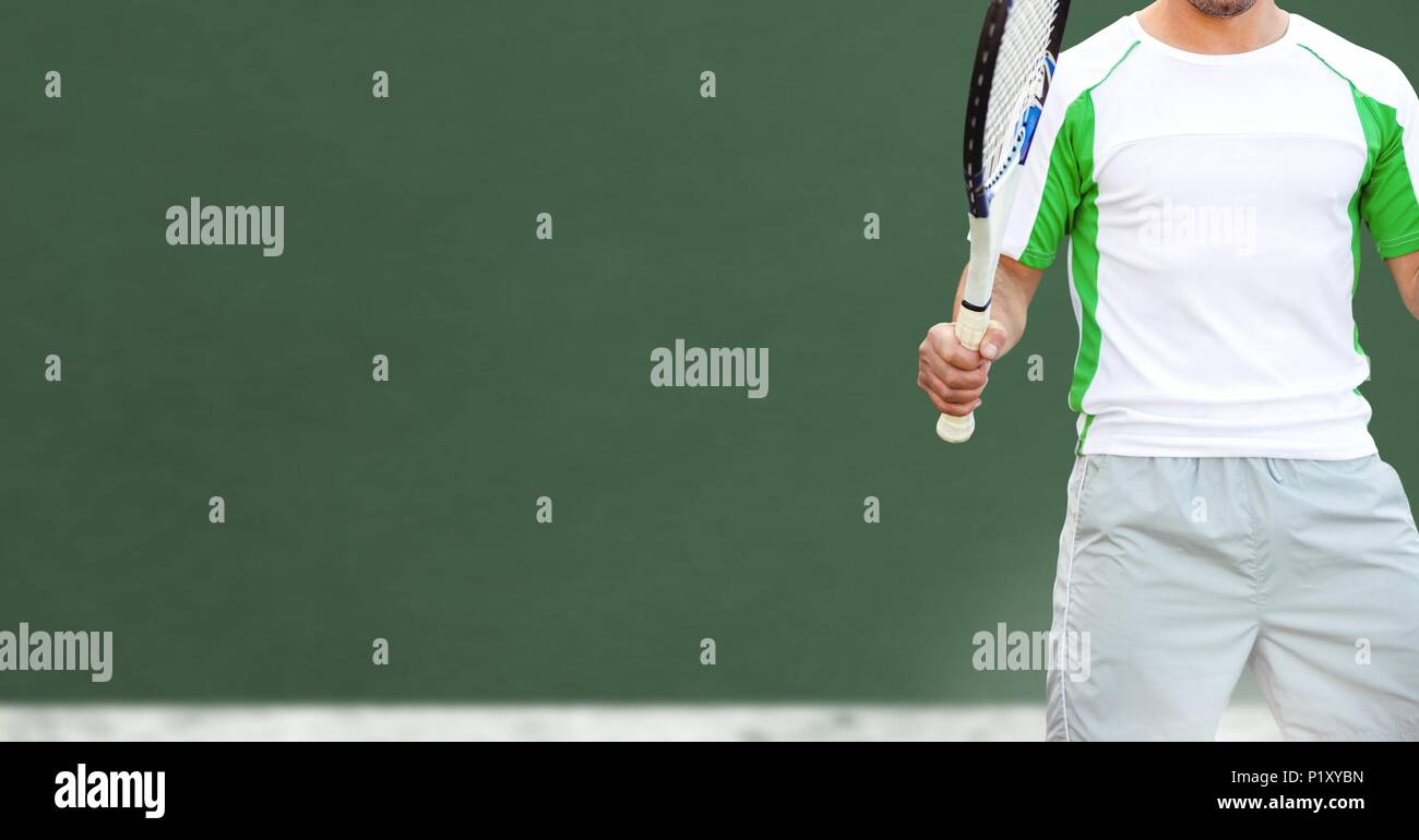 Tennis player with green background with racket Stock Photo - Alamy