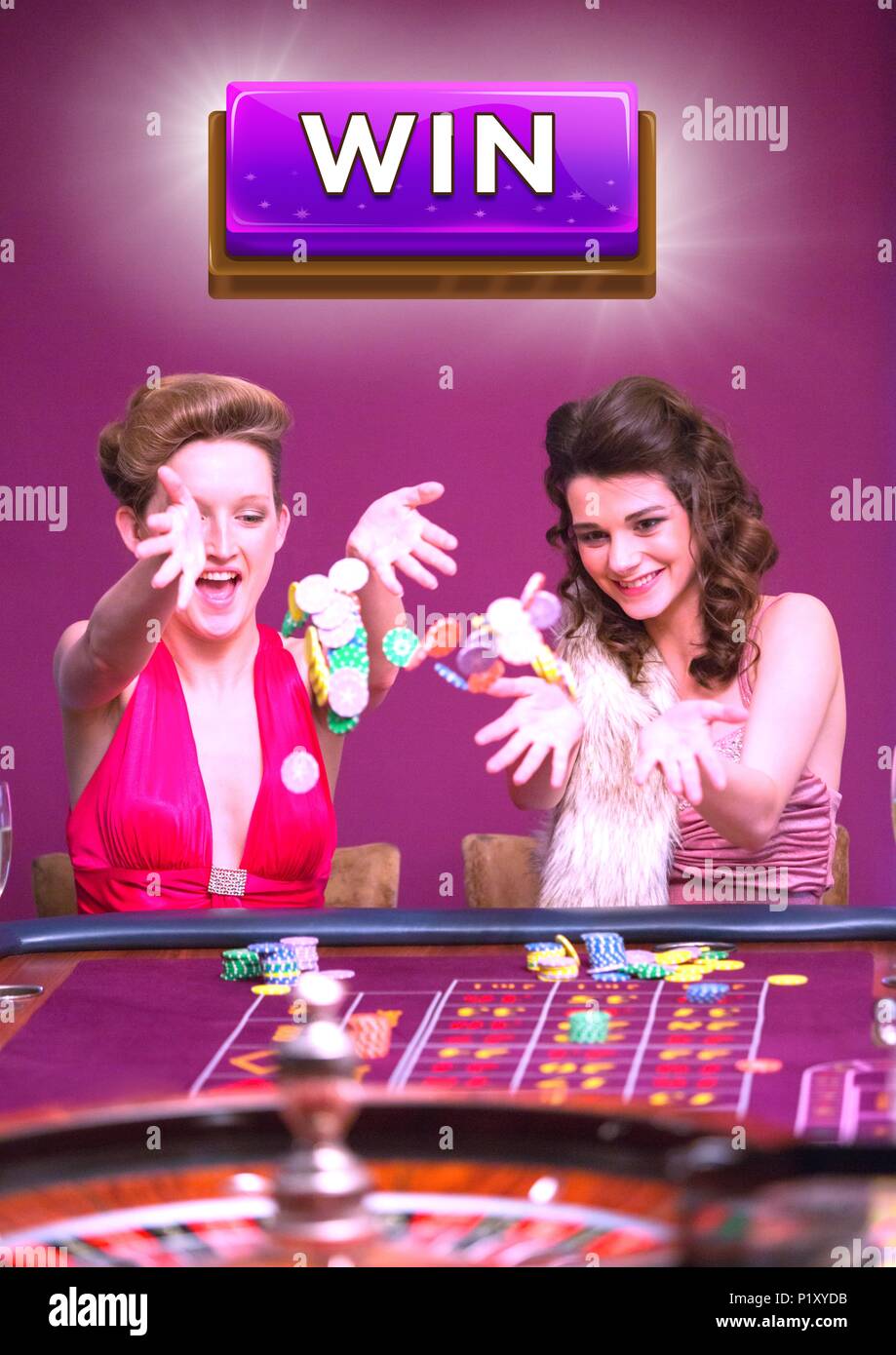 Win button with two women playing in casino Stock Photo