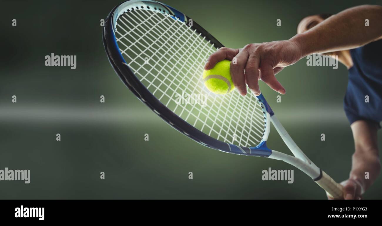 Tennis player with green background with racket Stock Photo - Alamy