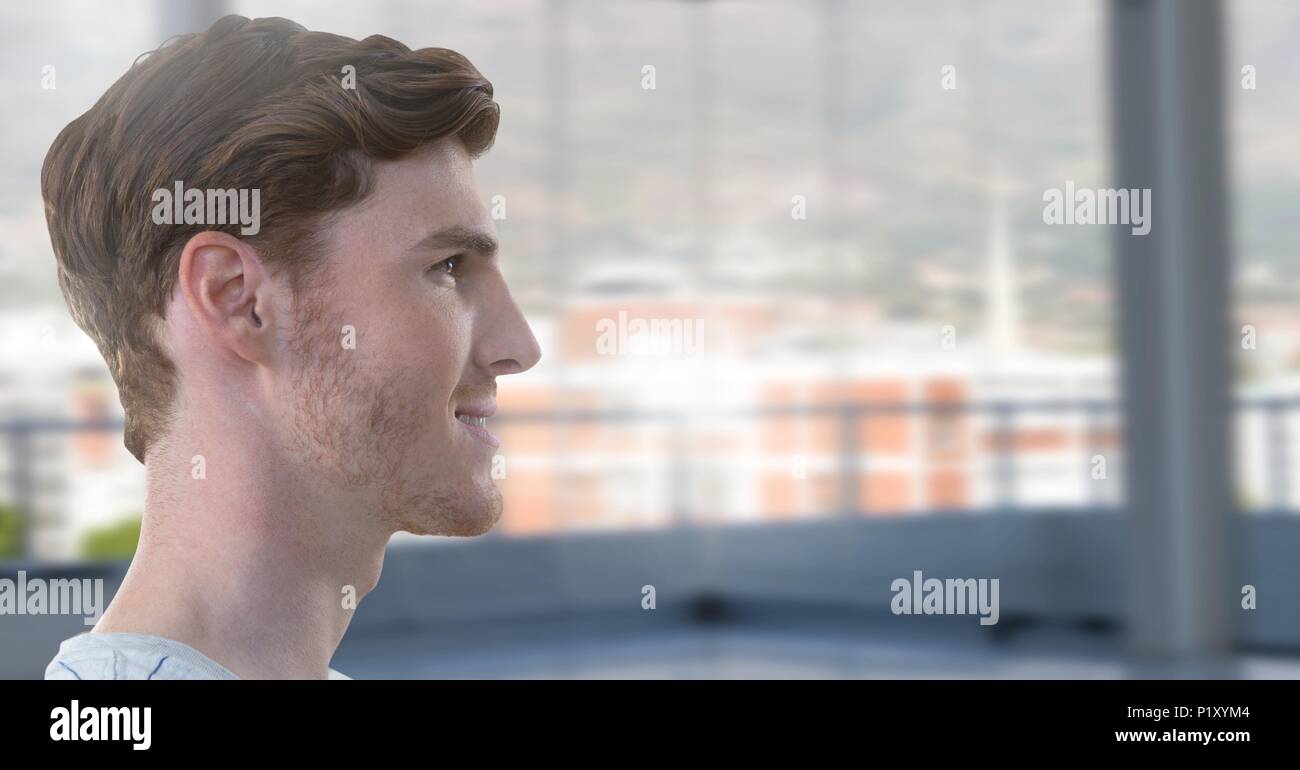 Man smiling looking sideways in office Stock Photo