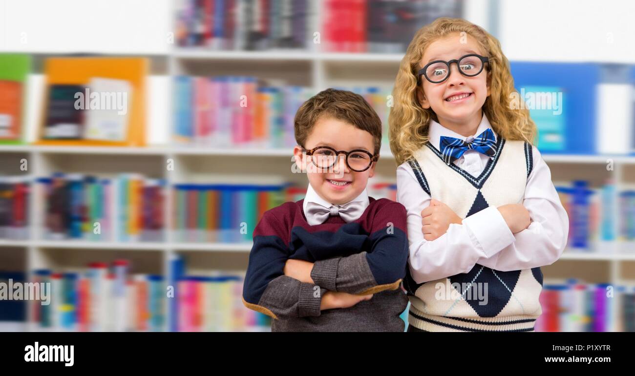 Boy and girl in education library Stock Photo - Alamy