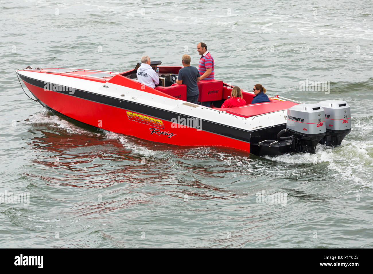 Scarab Panther Racing boat at Poole Harbour, Poole, Dorset, England UK in June Stock Photo