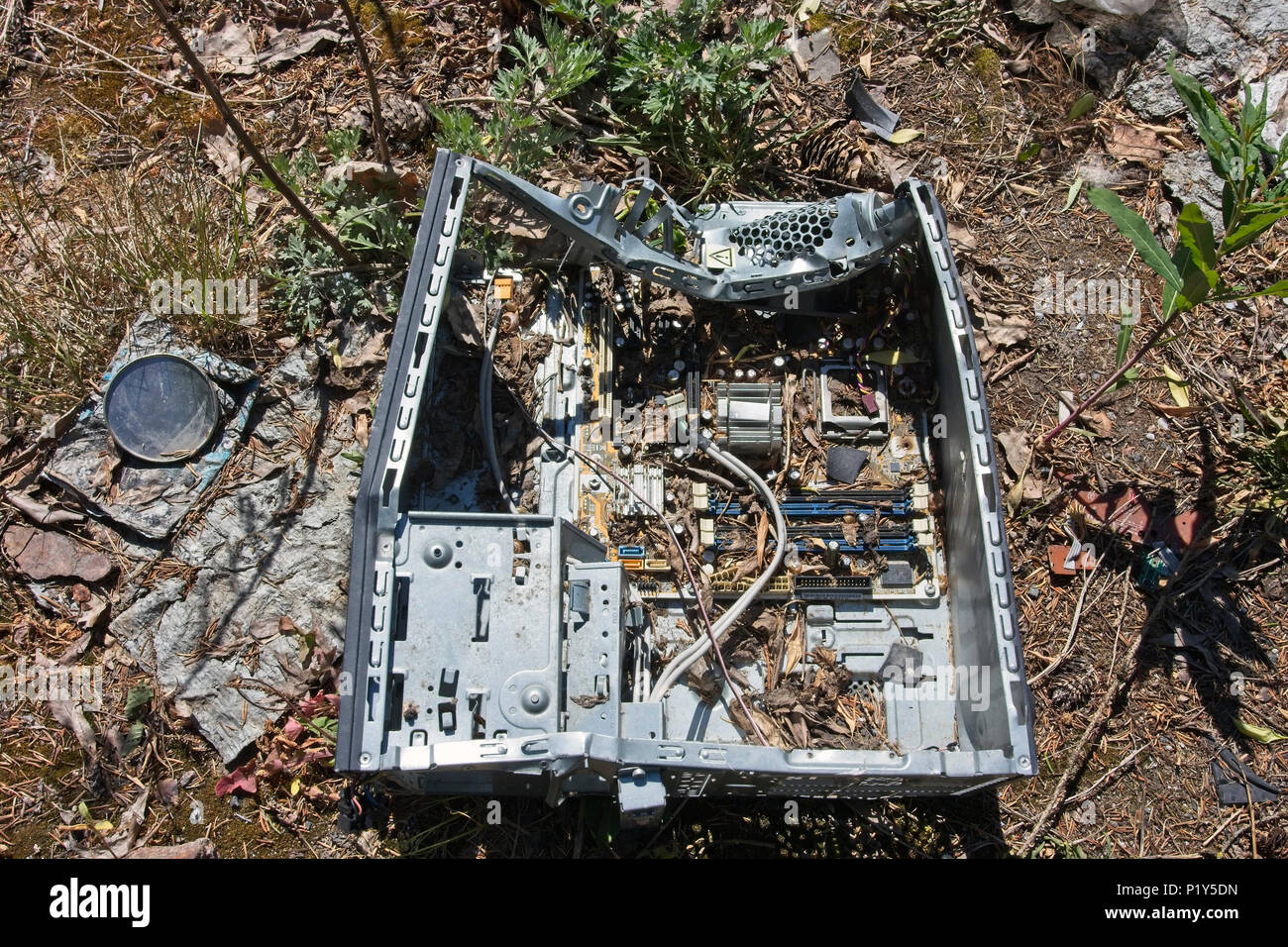 broken computer on ground outdoors Stock Photo Alamy