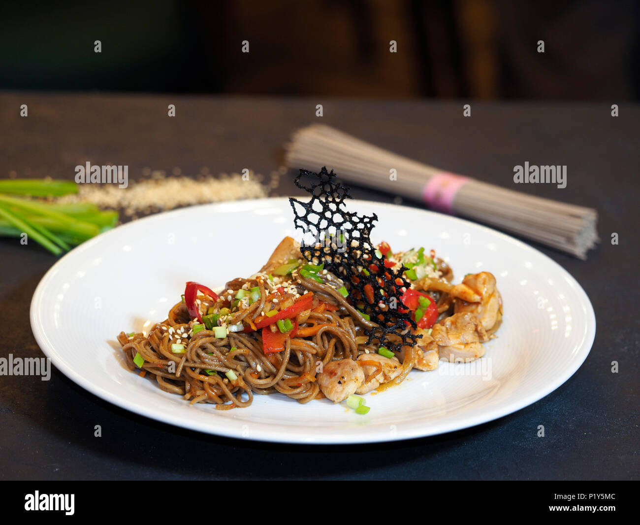 Buckwheat noodles Soba, onion, carrots, Bulgarian pepper, chicken thighs, chili peppers, hot