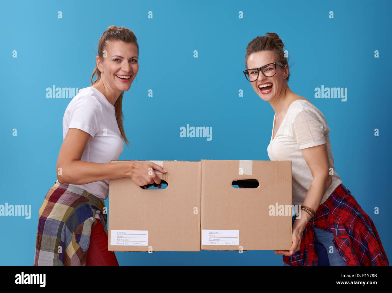 Women Packing Boxes High Resolution Stock Photography and Images - Alamy