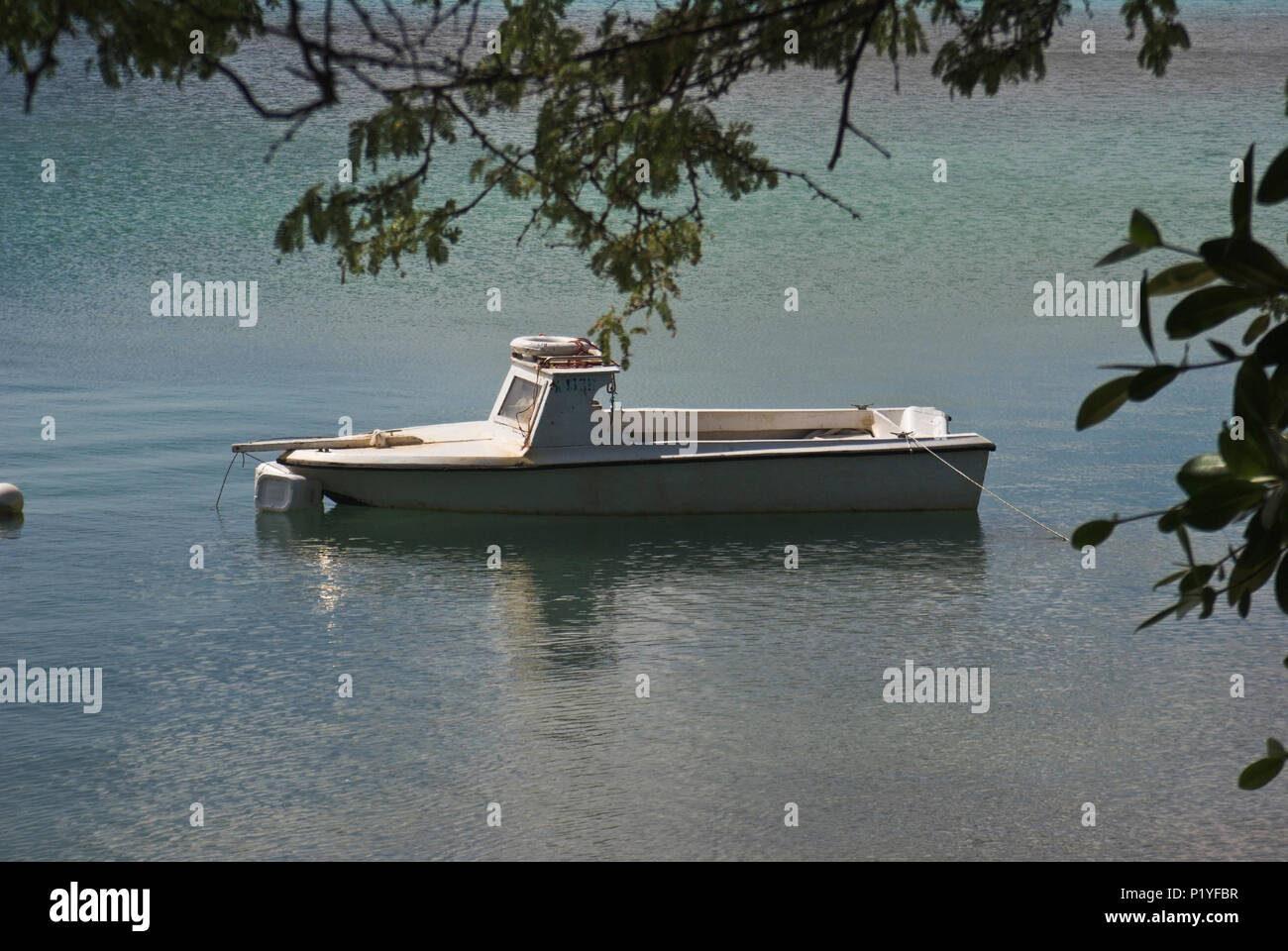 A boat waits for its next fishing adventure Stock Photo