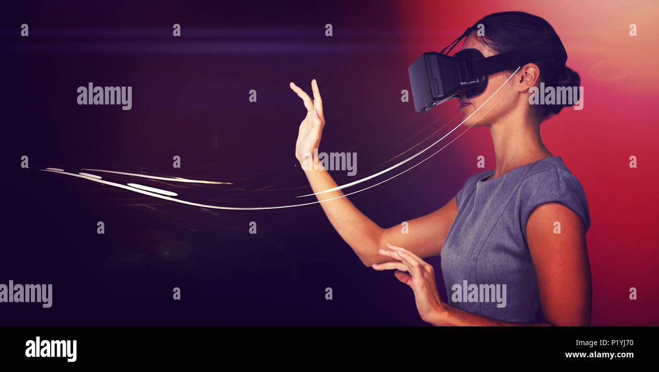 Side view of young woman gesturing while using virtual video glasses