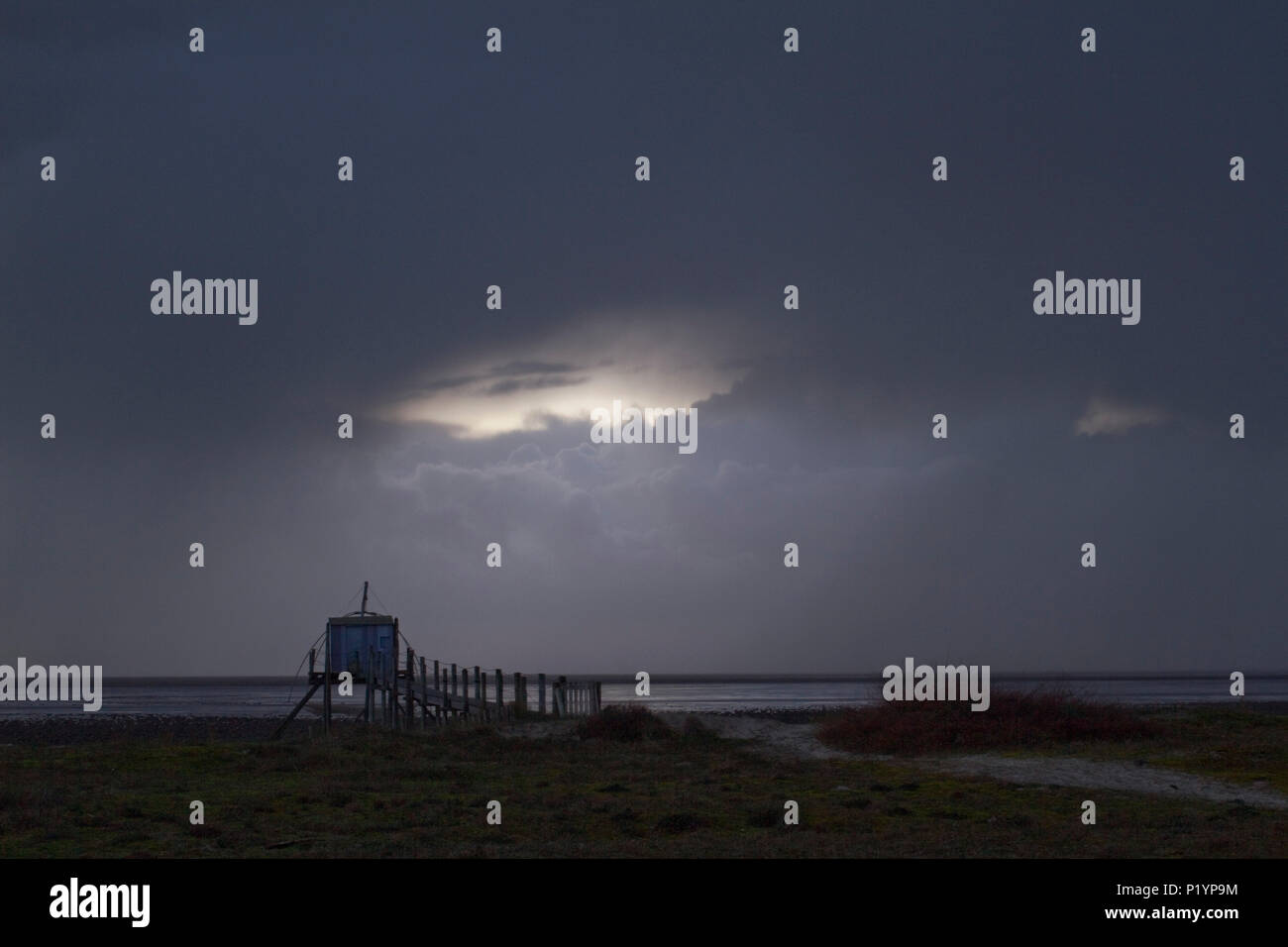 France, Les Moutiers-en-Retz, fishery under a threatening sky. Stock Photo