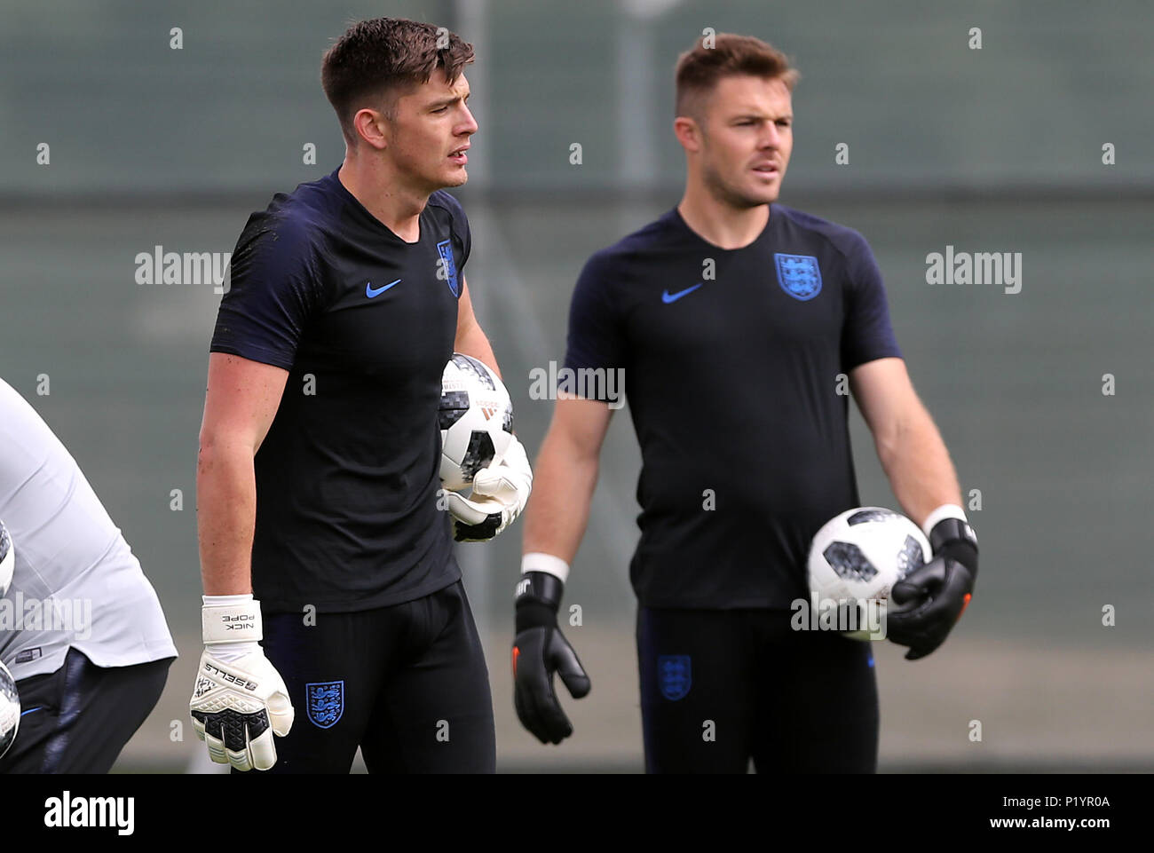 England goalkeepers Nick Pope (left) and Jack Butland during the training session at the Spartak Zelenogorsk Stadium, Repino. Stock Photo