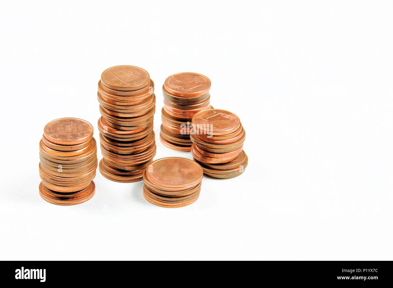 Stack of Eurocent coins on white background. Stock Photo