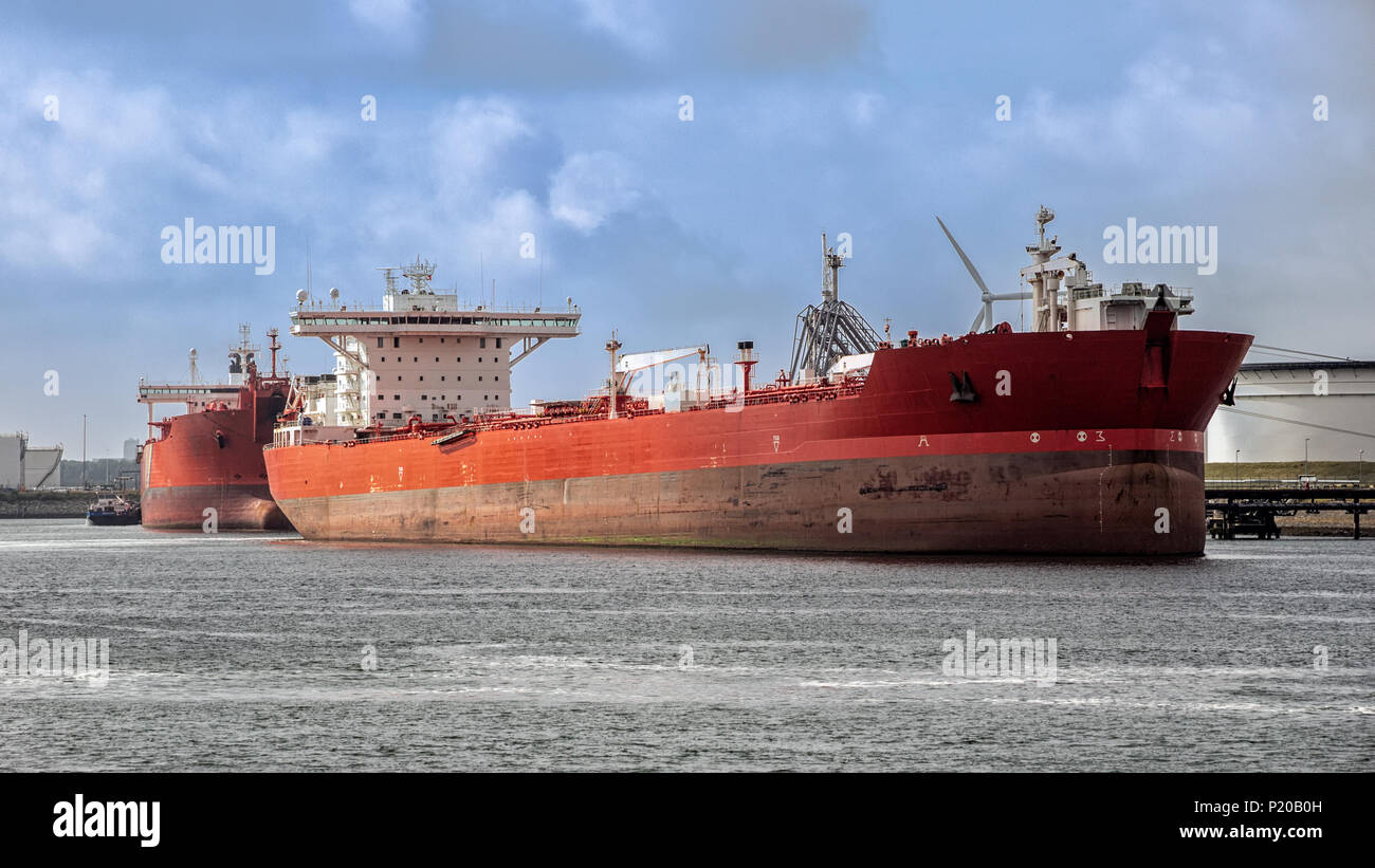 Red oil tanker moored at an oil terminal in the Port of Rotterdam Stock Photo