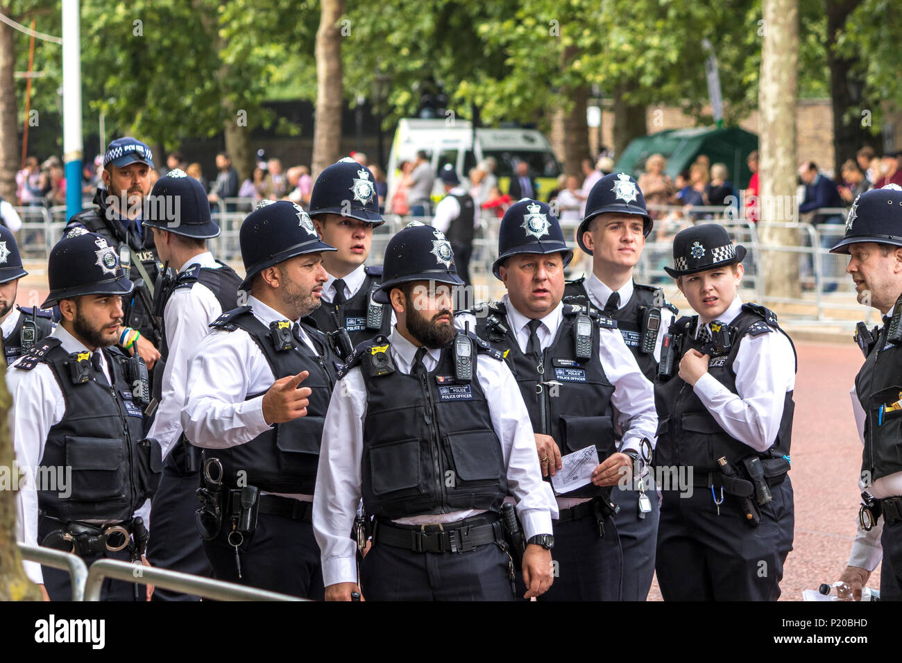 A group of Metropolitan Police officers on The Mall at Trooping The Colour or The Queen's Birthday Parade ,The Mall, London, UK Stock Photo