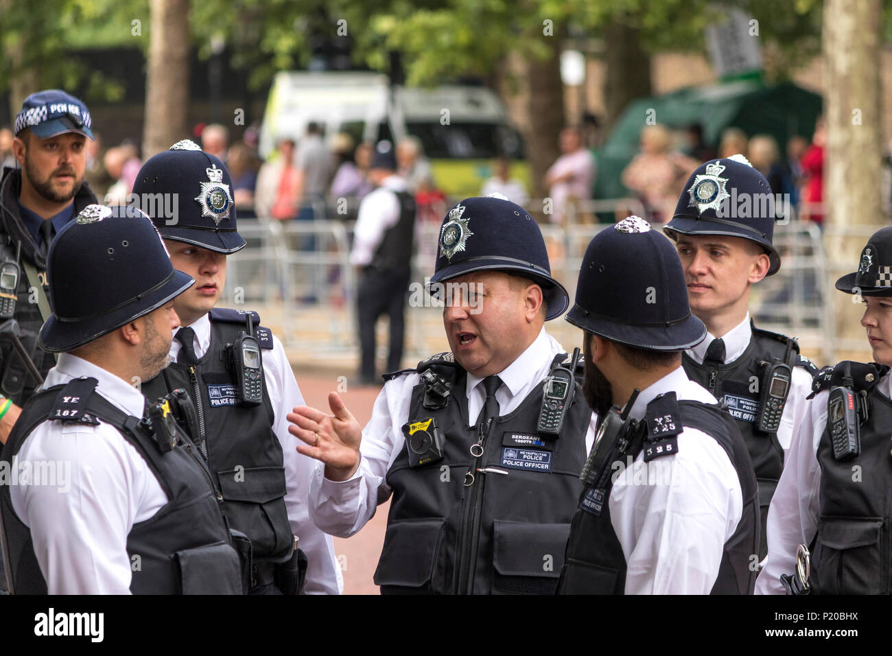 A group of Metropolitan Police officers on The Mall at Trooping The Colour or The Queen's Birthday Parade ,The Mall, London, UK Stock Photo