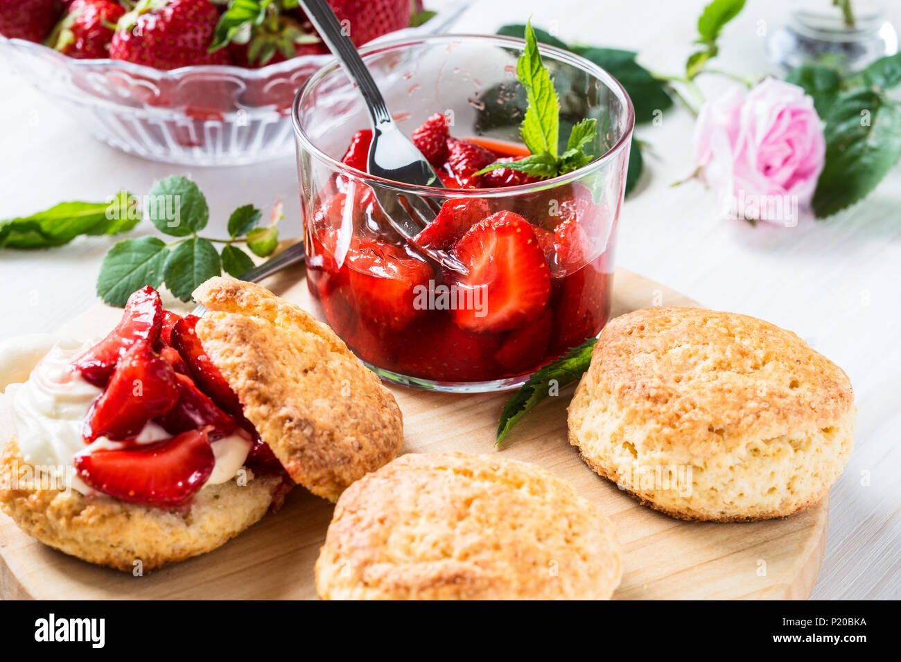 Homemade strawberry shortcake with vanilla whipped cream and berry compote Stock Photo