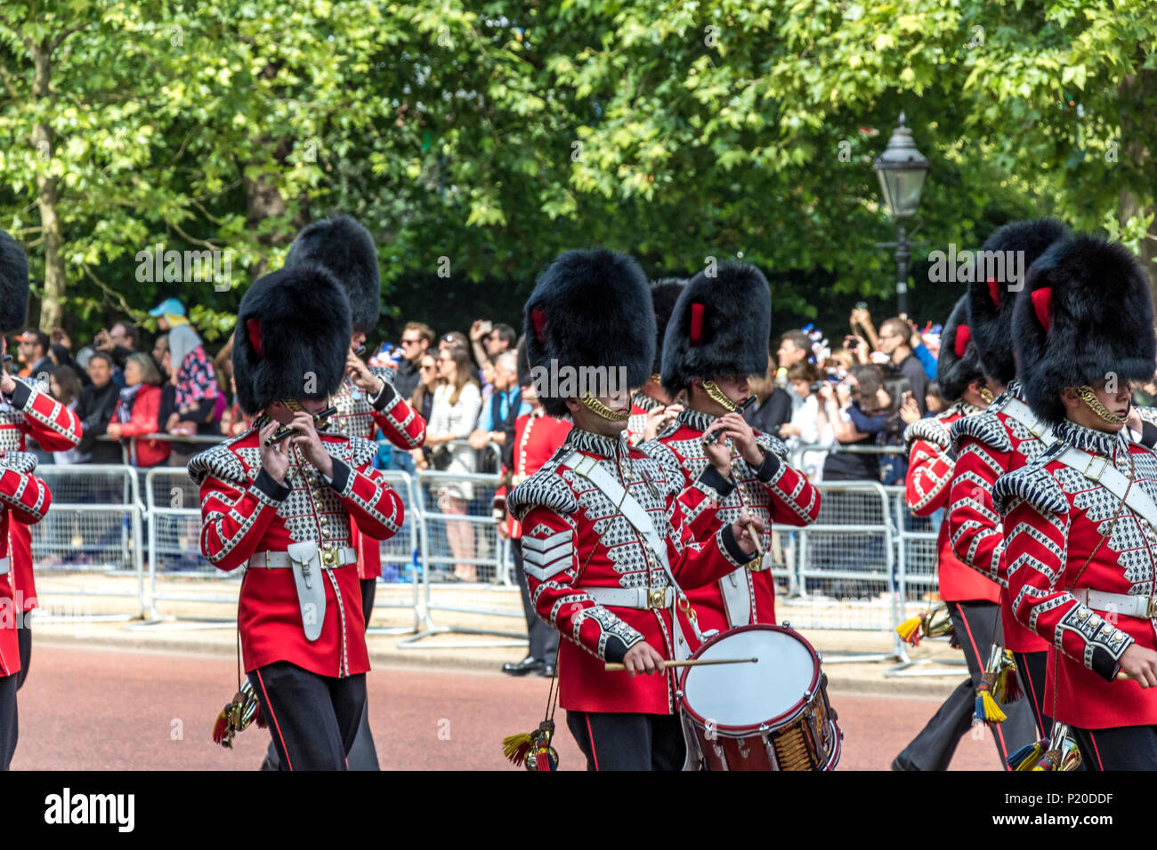 Massed Bands of The Foot Guards marching along the Mall at The Trooping Of The Colour /Queens Birthday parade 2018 Stock Photo