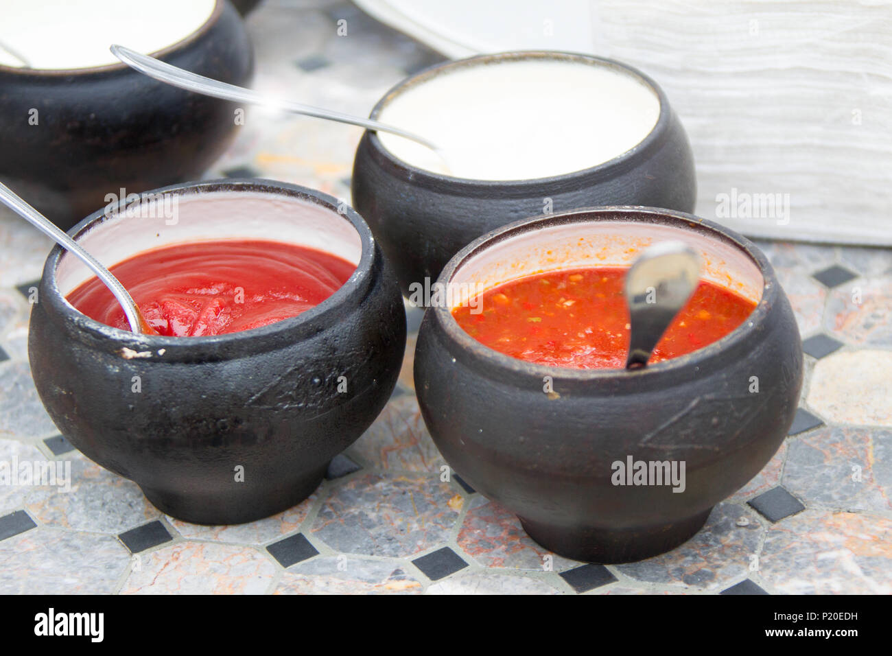 Food in cast iron pots Stock Photo Alamy