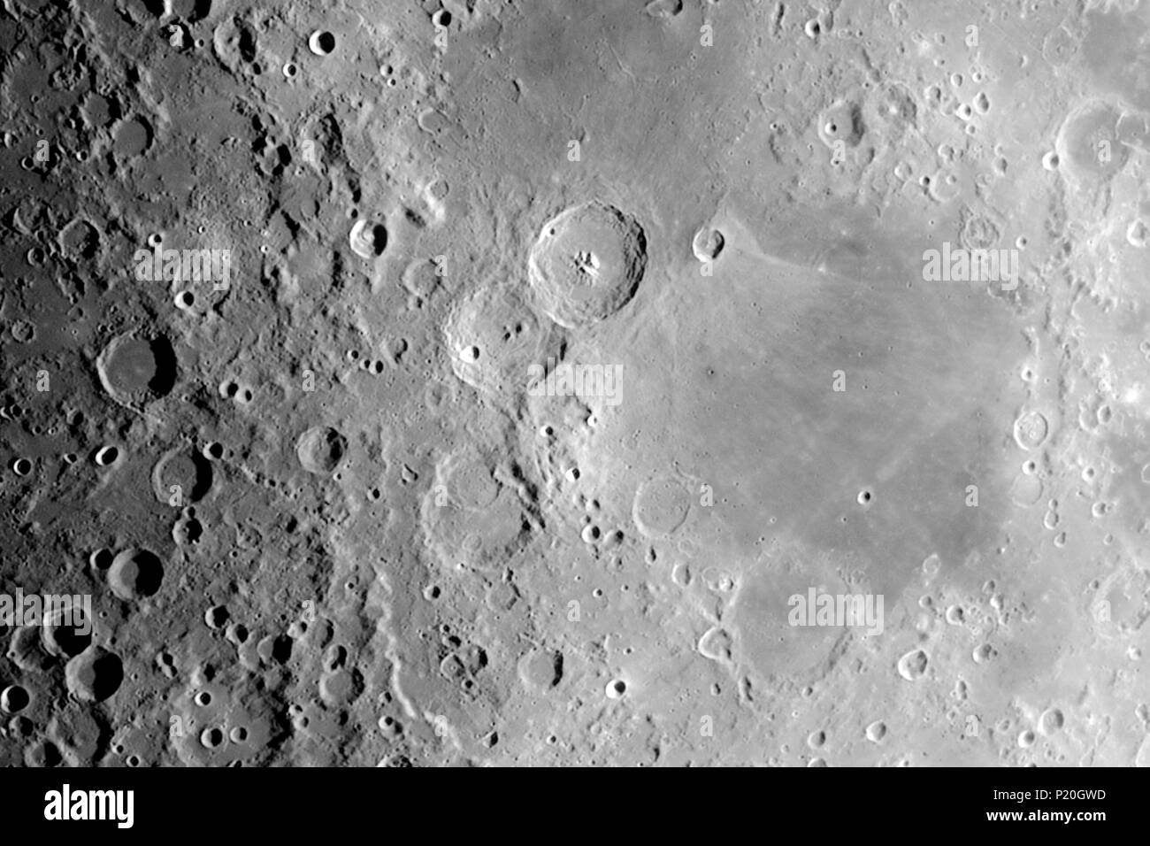 The Moon in very close-up. In the center and from top to bottom, the craters Theophile, Cyril and Catherine. On their right the Sea of Nectars. Stock Photo