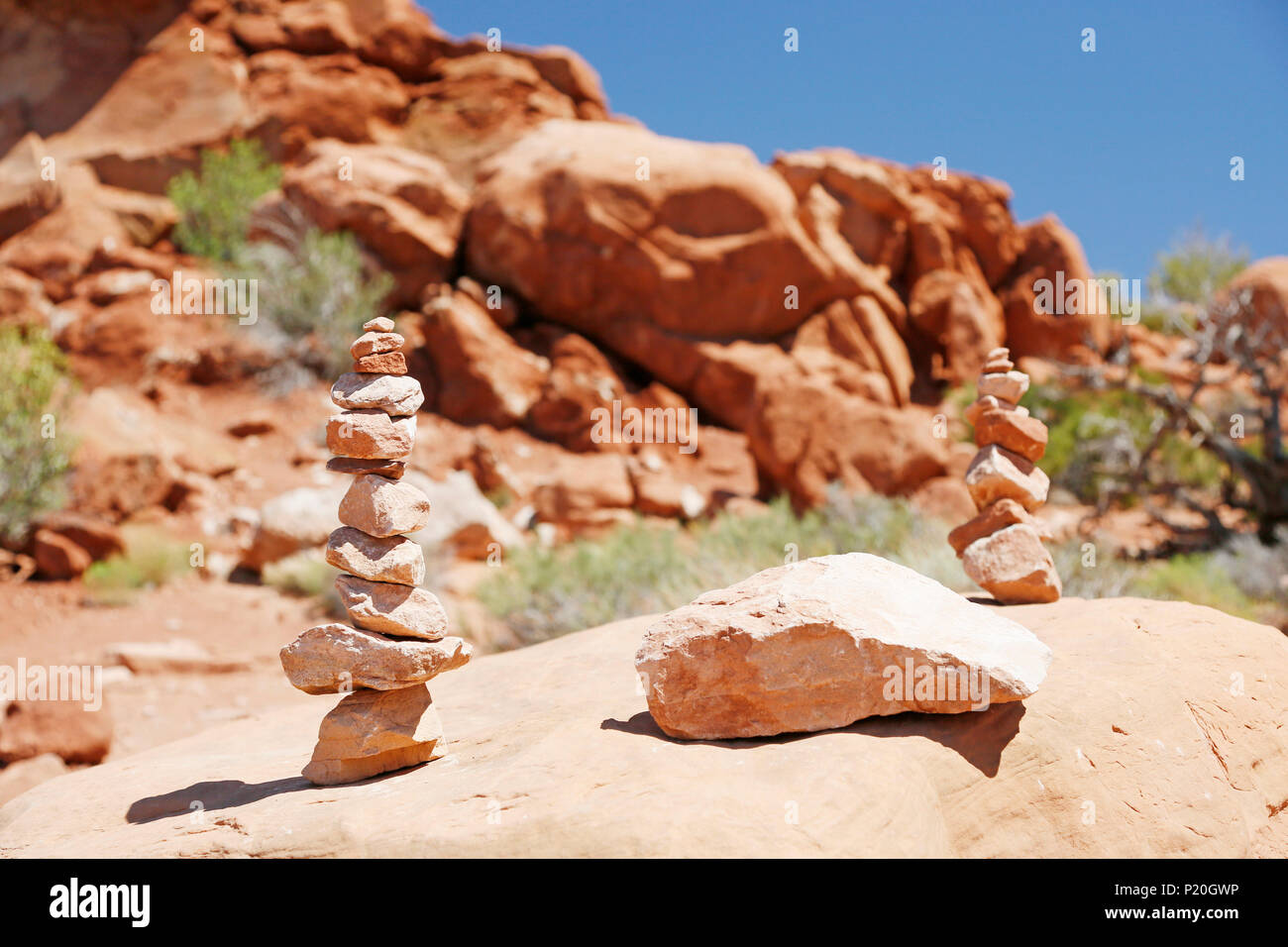 USA. Utah. Arches National Park. Balanced Rock. Stones stacked by tourists. Stock Photo