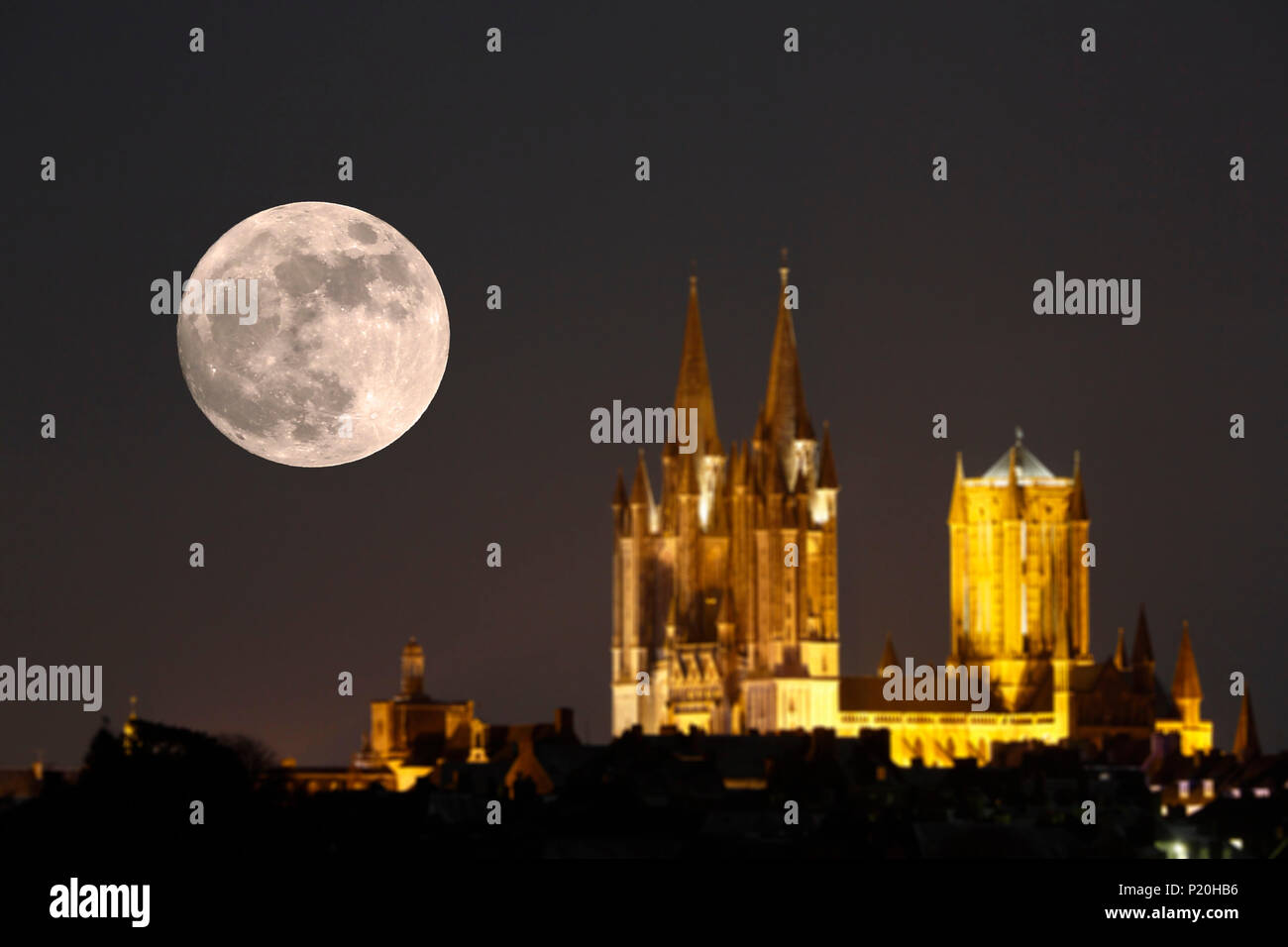 Normandy. Manche. Coutances. Super Moon 2018. The Super Moon above the cathedral on January 1st, 2018. Focus on the moon. Stock Photo