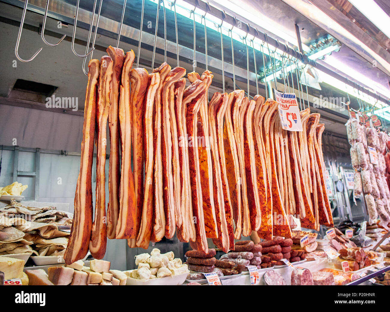 Marinated Pancetta for sale in a stall of a spanish food market Stock