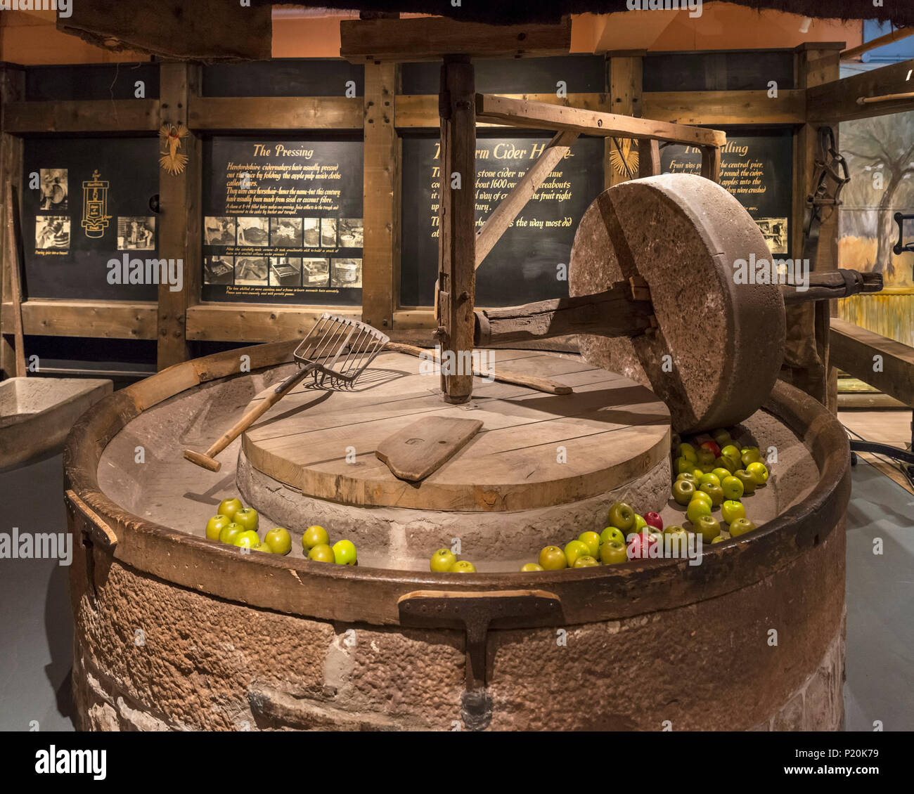 Cider making. Old stone mill for crushing apples, Hereford Cider Museum