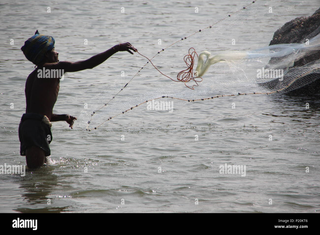 Old school Net fishing at Kudle beach in Gokarna, India Stock