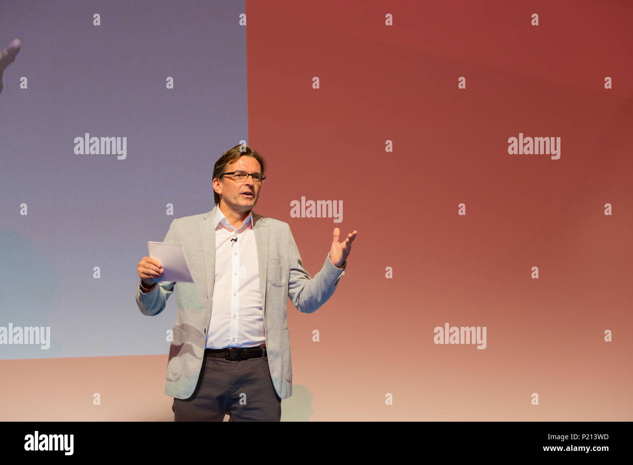 Cologne, Germany, June 13 2018, broadband fair Angacom:  Moderator Claus Strunz spricht auf dem Podium.             Credit: Juergen Schwarz/Alamy Live News Stock Photo