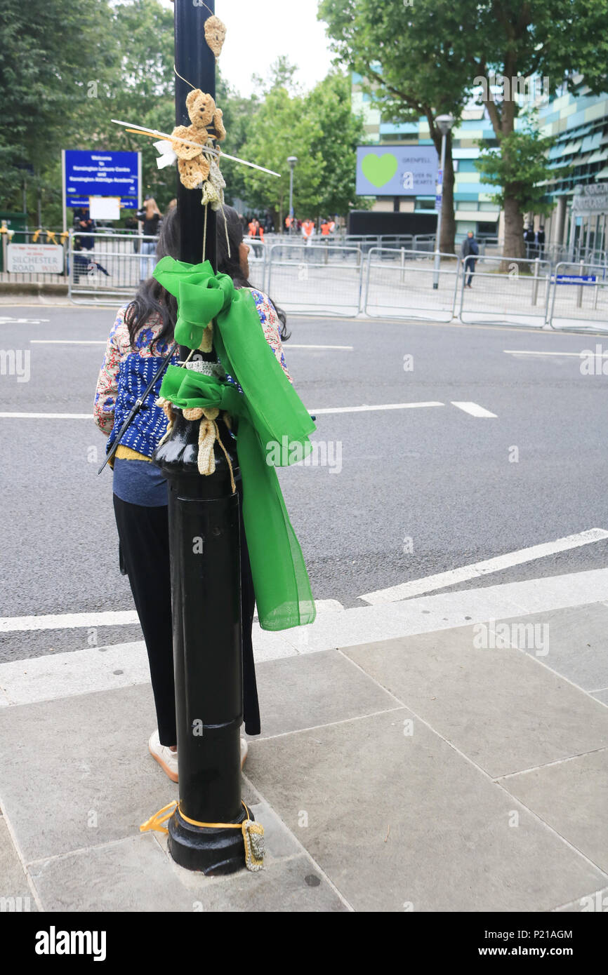 London UK. 14th June 2018. Grenfell anniversary a year after the fire  in West London which claimed the lives of 72 residents in the tower block.  A minute's silence will be observed nationally at midday to rembers the victims of the Grenfell fire on 14 June 2018. Credit: amer ghazzal/Alamy Live News Stock Photo