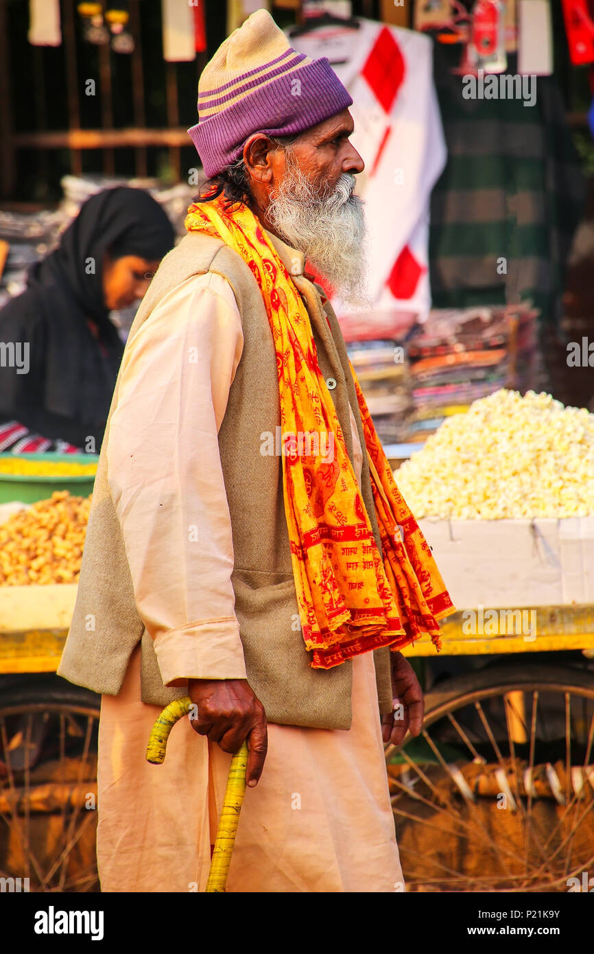 Local man walking at Kinari Bazaar in Agra, Uttar Pradesh, India. Agra is one of the most populous cities in Uttar Pradesh Stock Photo