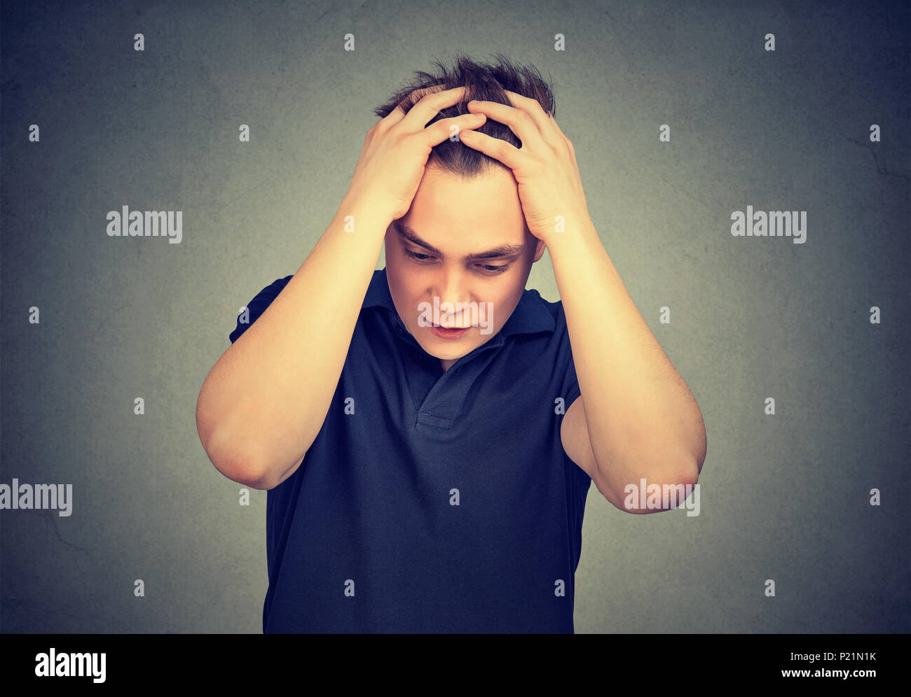 Stressed sad man in a desperate situation Stock Photo