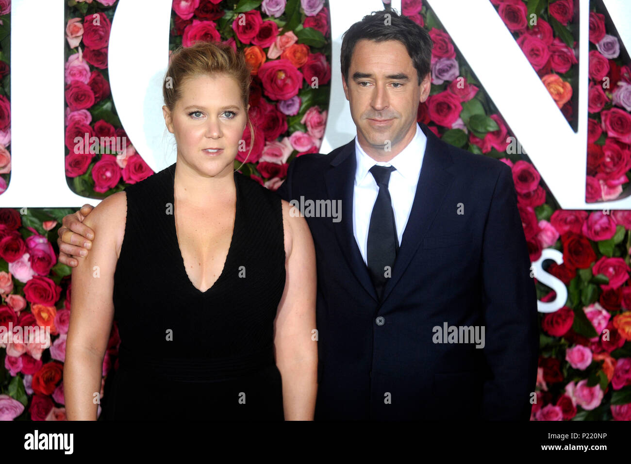 Amy Schumer and her husband Chris Fischer attending the 72nd Annual Tony Awards 2018 at the Radio City Music Hall on June 10, 2018 in New York City. Stock Photo